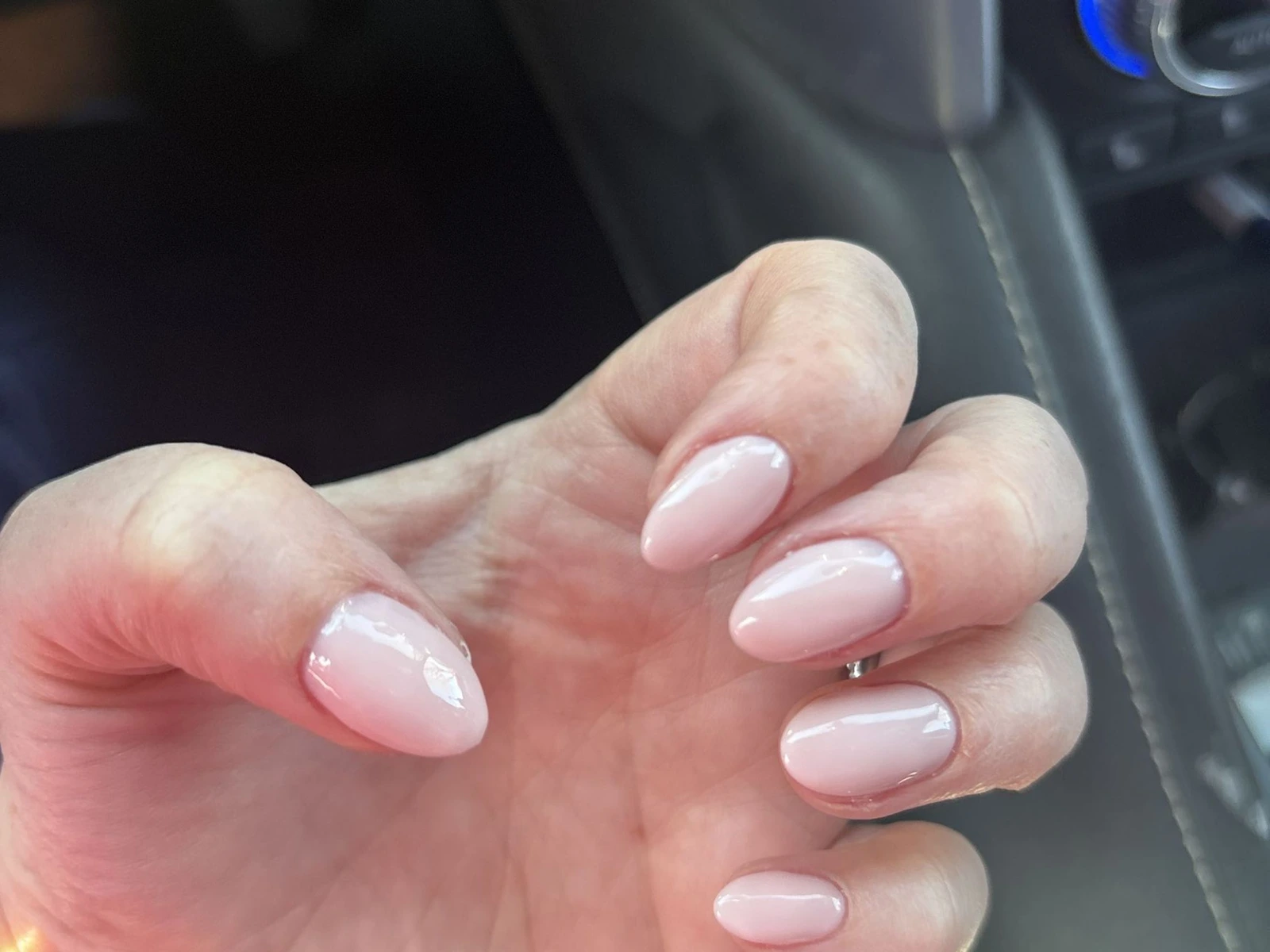 Glossy blush almond nails